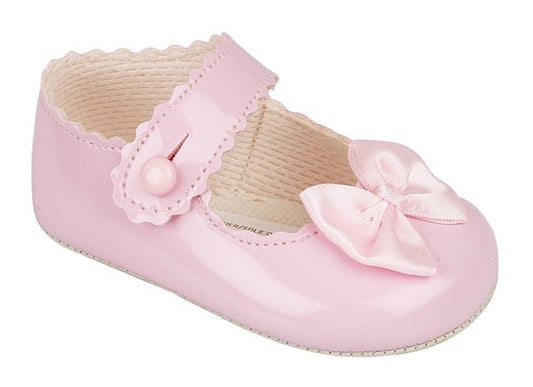 Pink patent bow shoe
